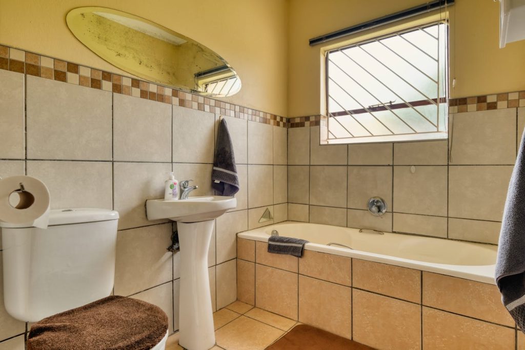 Interior of a Clean Tiled Bathroom